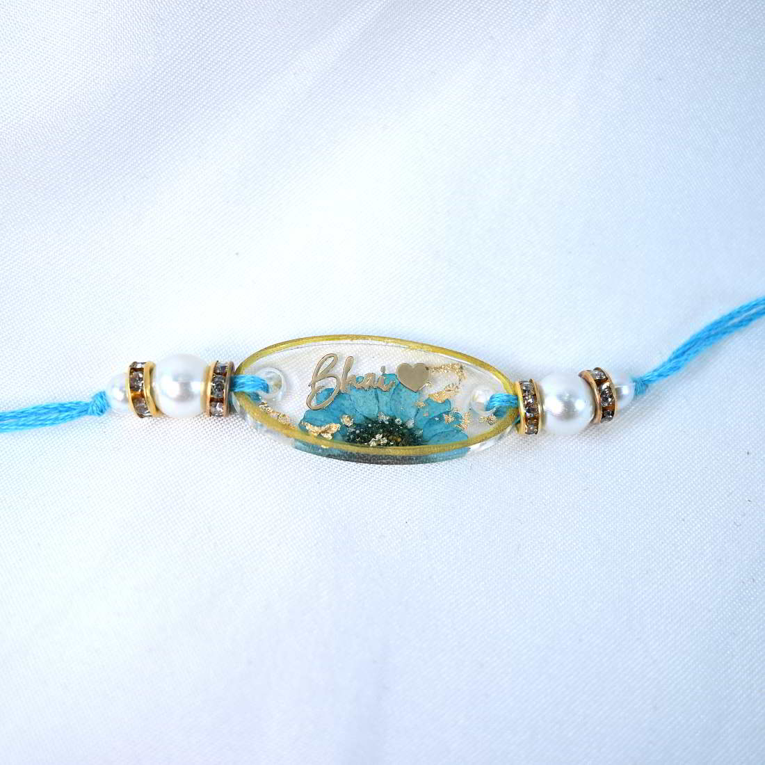 Beautiful Handmade Transparent With Original Blue Flower With Golden Text Bhai  With Heart 