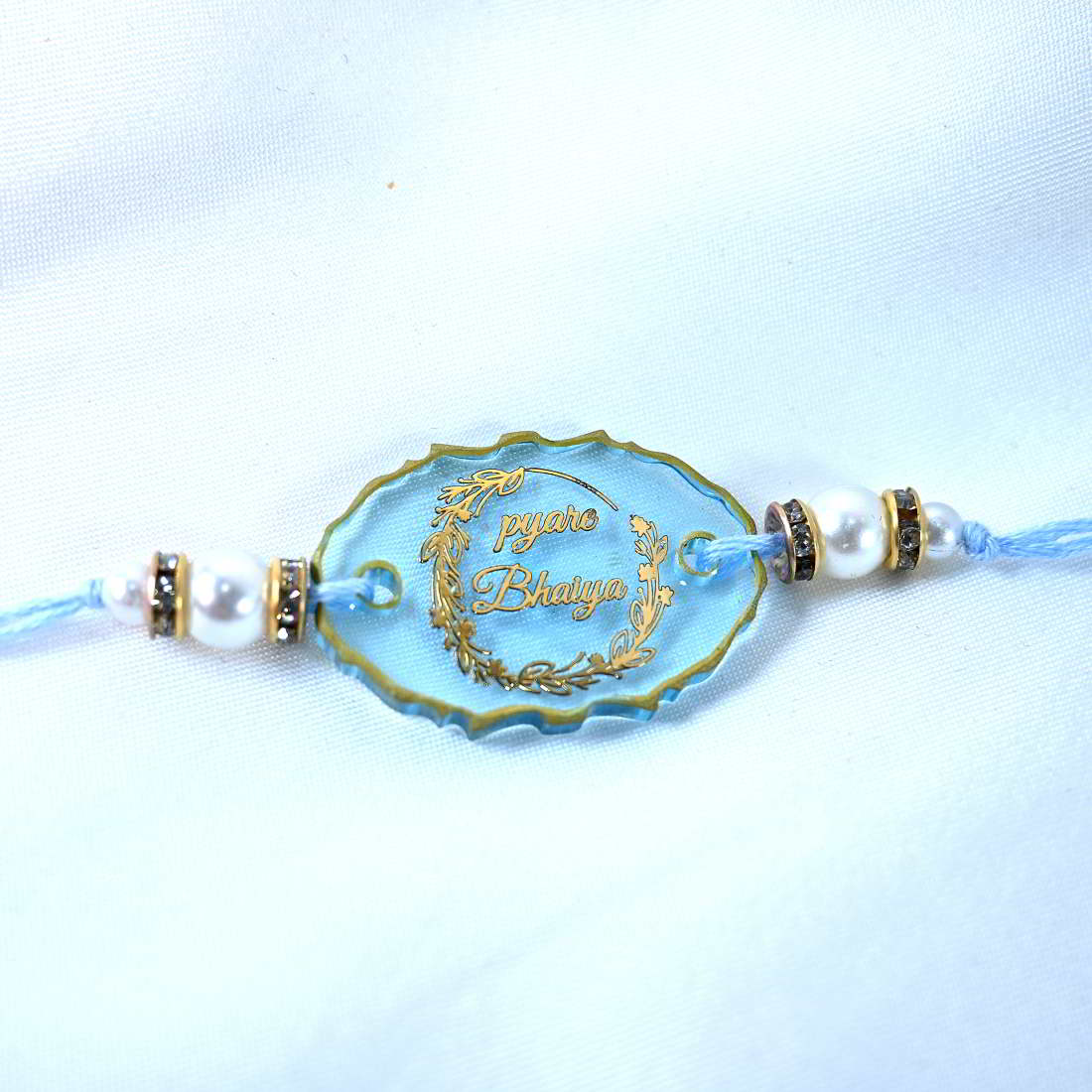 Beautiful Transparent Blue Shade Pyare Bhaiya Golden Text Rakhi