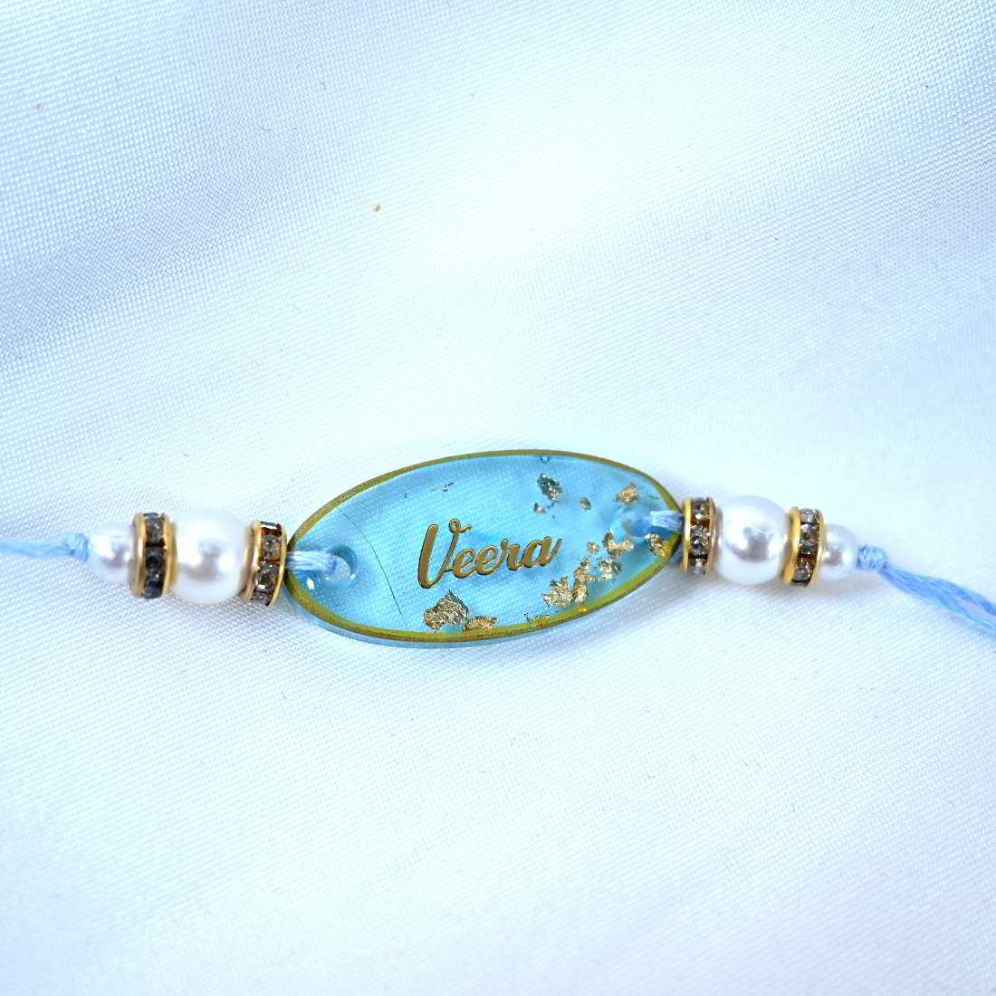 Beautiful Transparent Blue Shade Veera Rakhi