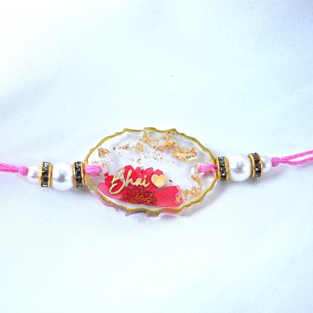 Beautiful Transparent Rakhi With Golden Text Bhsi With Golden Heart Original Pink Flower